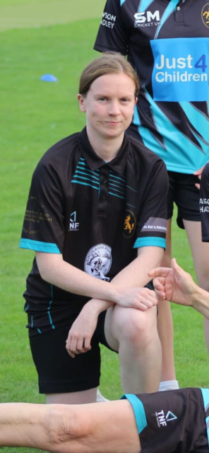 Charlotte on a sports pitch.